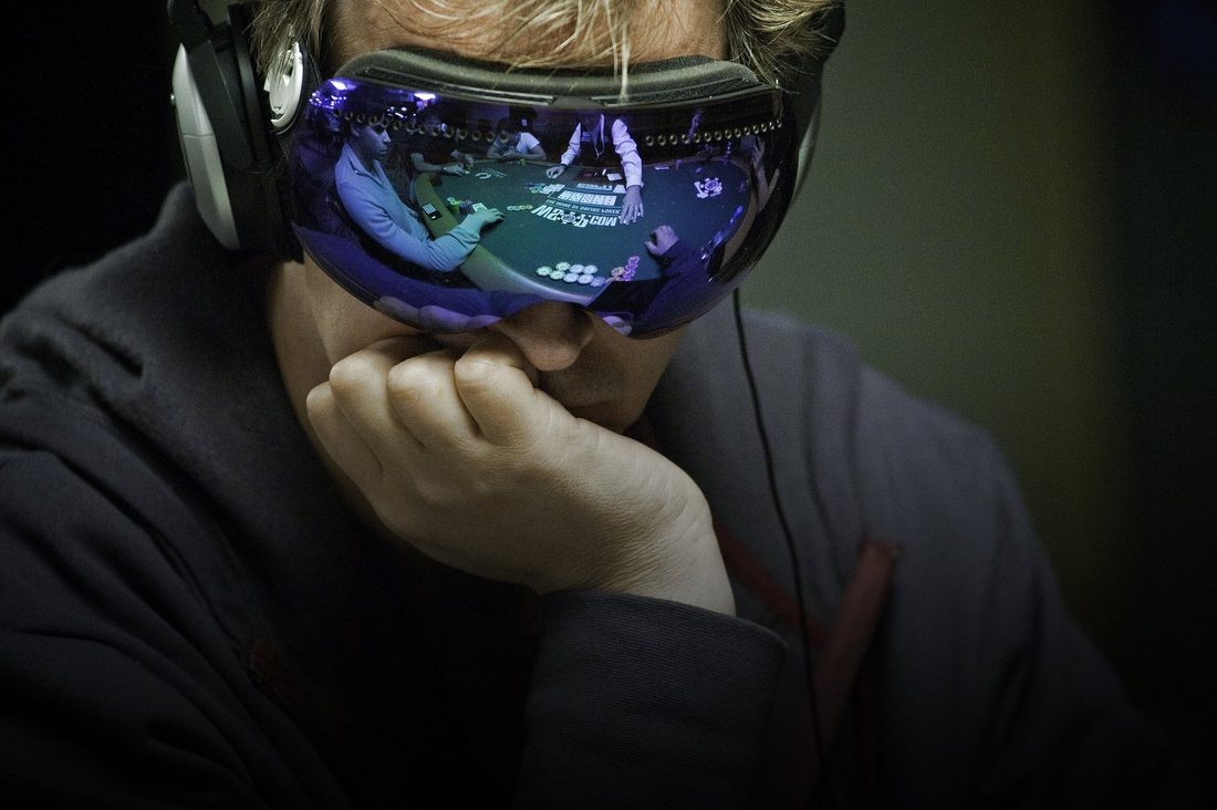 Poker player in mirrored goggles, photographed by Drew Amato
